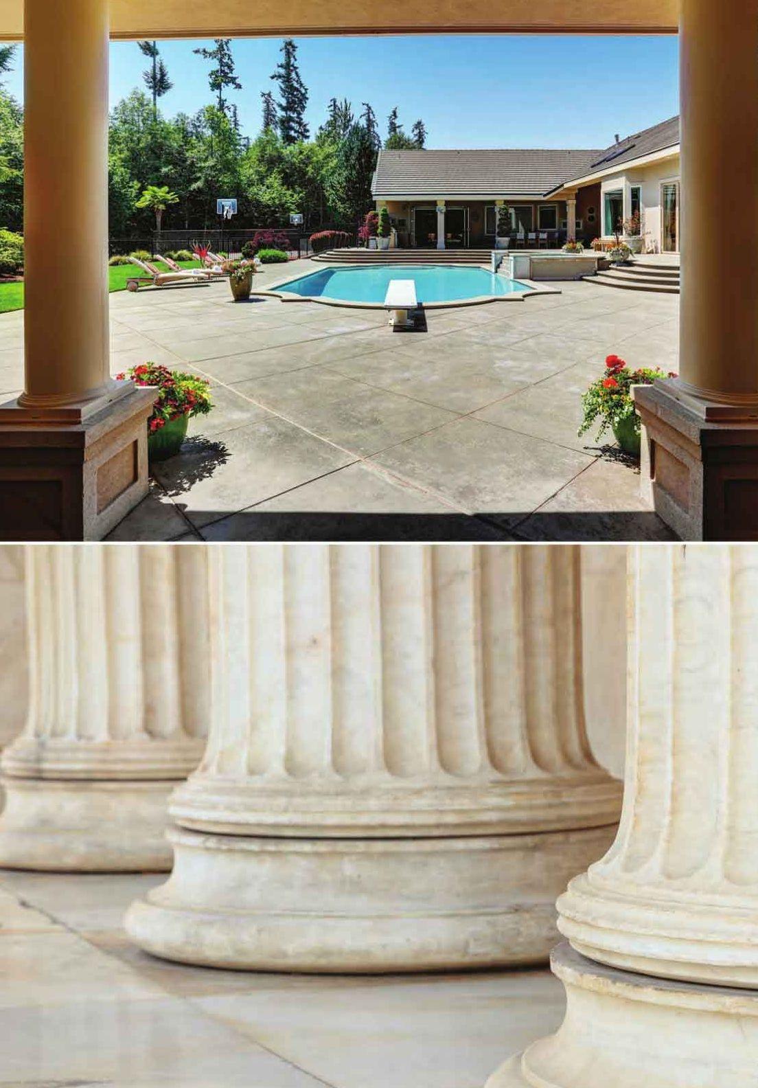 Colonne scanalate in pietra e piazzale pavimentato verso la piscina